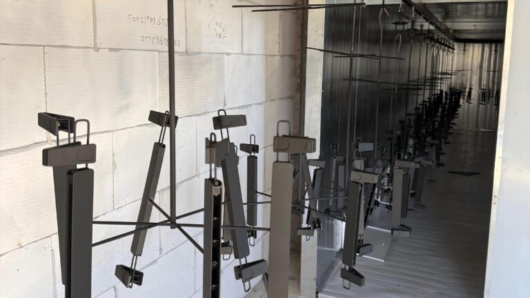 Non-slip coating application workshop for garment hangers